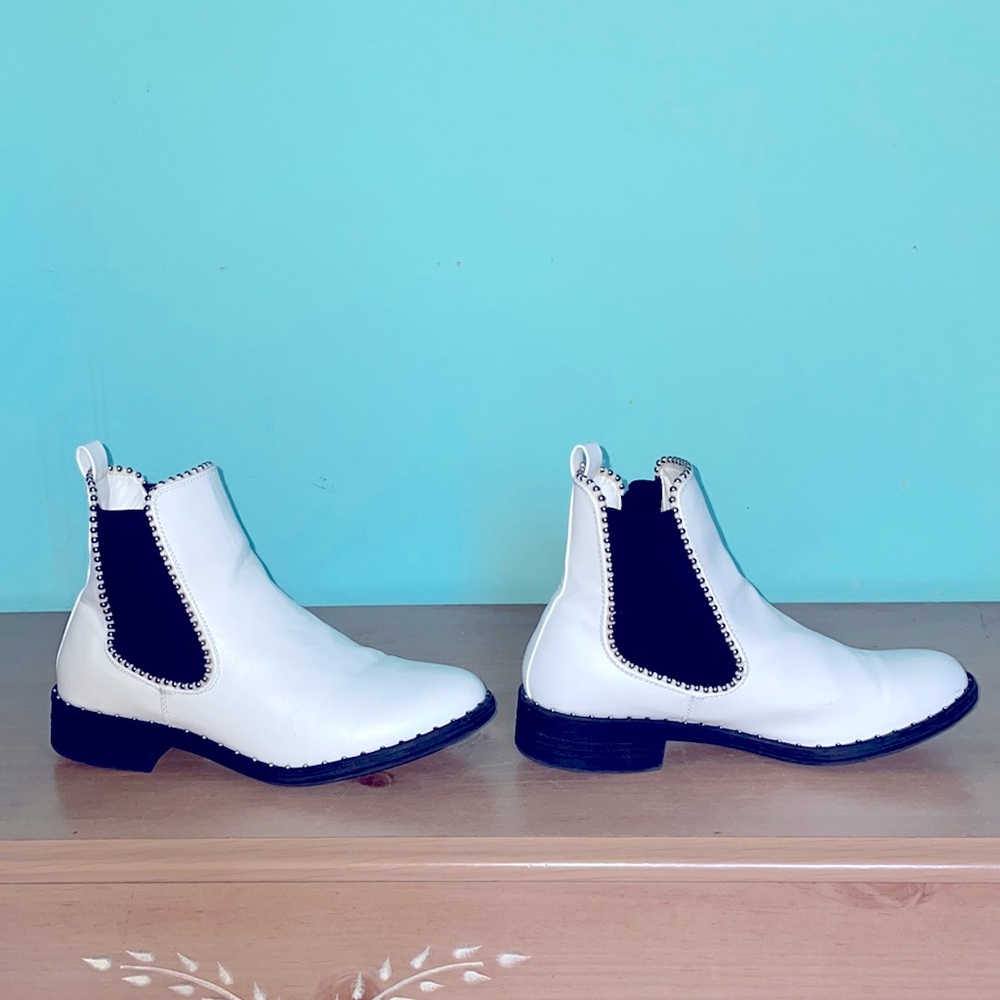 BRAND NEW never worn white and black boots.Size 7 and they have studs all over!